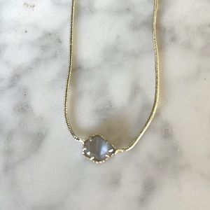 Kendra Scott silver necklace with light grey stone